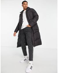 French Connection - Parka larga oscuro acolchada con capucha - Lyst