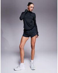 Nike - Swift Dri-fit Half Zip Long Sleeve Top - Lyst