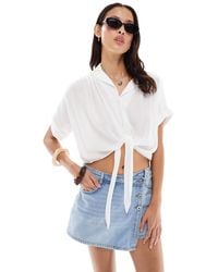ONLY - Mini- jupe-short portefeuille - clair délavé - Lyst