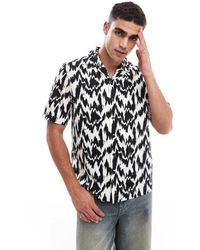 Fred Perry - Camicia A Maniche Corte Con Colletto A Rever E Stampa Animalier Color Nero E - Lyst