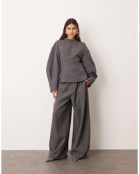 ARRANGE - Tailored Pleated Detail Wide Leg Barrel Pants - Lyst