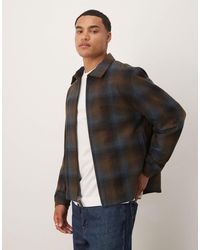 Calvin Klein - Veste en laine zippée à carreaux - Lyst