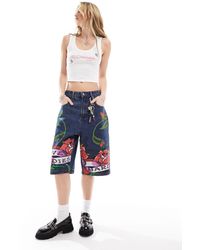 Ed Hardy - Relaxed Skater Longline Denim Shorts With Peachy Bum Print - Lyst