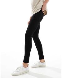 River Island - Spray On Jeans - Lyst