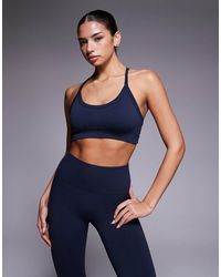 4505 - Sculpting Seamless Light Support Sports Bra With Adjustable Straps - Lyst