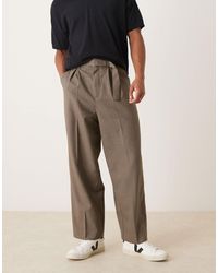 ASOS - Pantalon ample et élégant avec pinces à l'avant et ceinture - Lyst