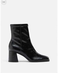 Stradivarius - Wide fit. basic stiefeletten mit mittelhohem absatz - Lyst