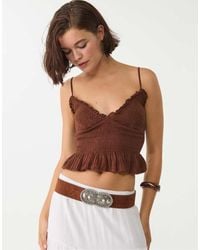 Stradivarius - Top Aderente Con Volant - Lyst