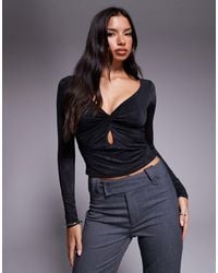 Tiger Mist - Saffira Long Sleeve Plunge Neck Cut-out Detail Textured Top - Lyst