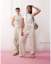 Weekday - Astro - jean unisexe coupe baggy à taille basse - beige délavé effet sali - Lyst