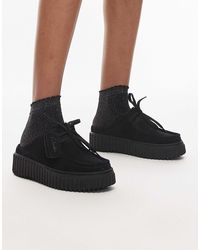 Clarks - – torhill – mules mit futter aus teddyfell - Lyst