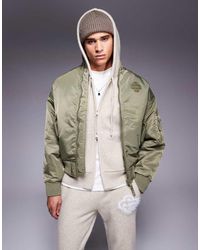 The Couture Club - Oversized Emblem Bomber Jacket - Lyst