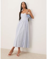 Bardot - – lola – midikleid mit en streifen und korsett-oberteil - Lyst