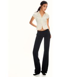 Bershka - Bootcut Broek Met Lage Taille - Lyst