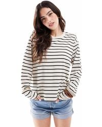 Monki - Top A Maniche Lunghe Oversize A Righe Bianche E Nere - Lyst