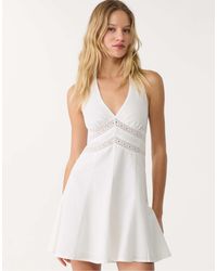 Stradivarius - – kurzes neckholder-kleid aus leinenmix - Lyst