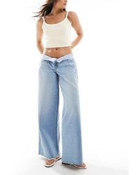 Hollister - Super Baggy Jeans Met Lage Taille En Onafgewerkte Zoom - Lyst