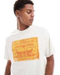 Levi's - T-shirt à imprimé style cuir effet vintage - crème - Lyst