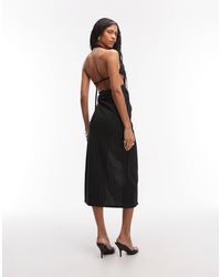 asos edition sequin cutwork open back midi dress ASOS EDITION sequin cutwork cami midi dress with fringe in black