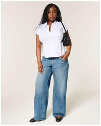 Hollister - Ultra Low-Rise Medium Wash Baggy Jeans - Lyst