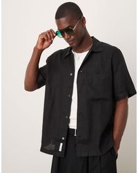 ARKET - Chemise en lin manches courtes avec poche avant - Lyst