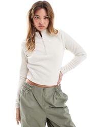 Nike - Phoenix - top en polaire à manches longues et col zippé - beige - Lyst