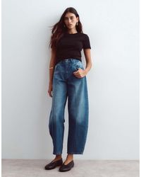 ARRANGE - Clover Front Seam Detail Jeans - Lyst