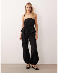 ASOS - Cami Peplum Jumpsuit With Embroidered Trousers - Lyst