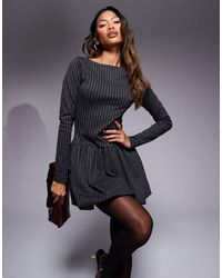 ASOS - Robe bouffante à manche longues et fines rayures - bleu marine - Lyst