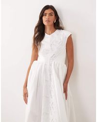 ARRANGE - Embroidered Cinched Waist Pleated Maxi Dress - Lyst