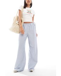 ONLY - Pantalones Azules A Rayas De Pernera Ancha Con Detalle De Lazada De - Lyst