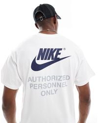 Nike - T-shirt avec imprimé graphique et logo virgule au dos - Lyst