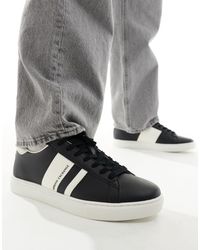 Armani Exchange - Sneakers nere e bianche con righe laterali con logo - Lyst