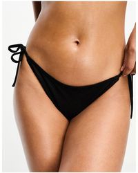 Calvin Klein - Intense power - slip bikini neri a coste con allacciatura laterale - Lyst