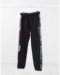 BDG Cotton Bandana Patchwork Print Sweatpant in Purple for Men - Lyst