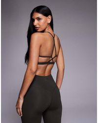 4505 - Open Back Light Support Sports Bra With Removable Padding - Lyst