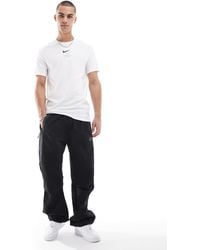 Nike - Pantaloni Tecnici Ampi Neri - Lyst