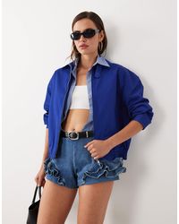 Mango - X hailey bieber - bomber zippé à col cheminée - électrique - Lyst
