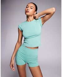 4505 - Cap Sleeve Performance Baby T-shirt - Lyst