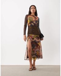 Never Fully Dressed - Midikleid aus mesh mit langen ärmeln, hohem schlitz und abstraktem print - Lyst