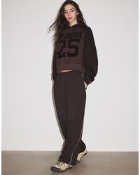Stradivarius - toggle jogger Trousers - Lyst