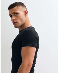4505 - Seamless Rib Muscle Fit Training T-shirt - Lyst