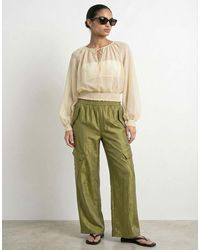 HYPEDROP - Blusa A Maniche Lunghe Cigno - Lyst