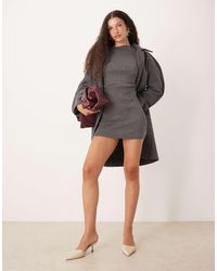 SNDY'S - Asymmetric Off Shoulder Ruched Mini Dress - Lyst