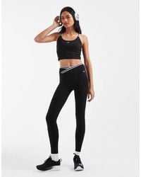 Under Armour - Motion Sport Tape leggings - Lyst