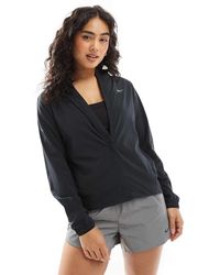 Nike - Chaqueta Negra Swift Repel De - Lyst