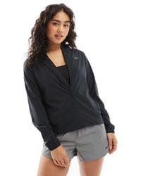 Nike - Chaqueta Negra Swift Repel De - Lyst