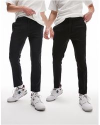 TOPMAN - Confezione da 2 paia di pantaloni eleganti neri e blu navy con fascia - Lyst
