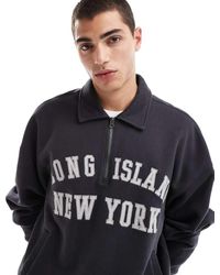 Hollister - Rechte Sweatertop Met Omgeslagen Kraag, Print En Korte Rits - Lyst
