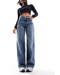 Pull&Bear - Jeans a fondo ampio a vita medio alta sporco - Lyst